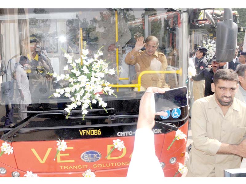 shehbaz sharif sits in a bus after inauguration photo inp