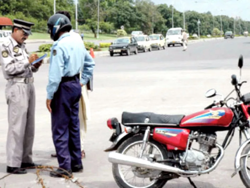 according to the islamabad traffic police hundreds of others were also ticketed photo file according to the islamabad traffic police hundreds of others were also ticketed photo file