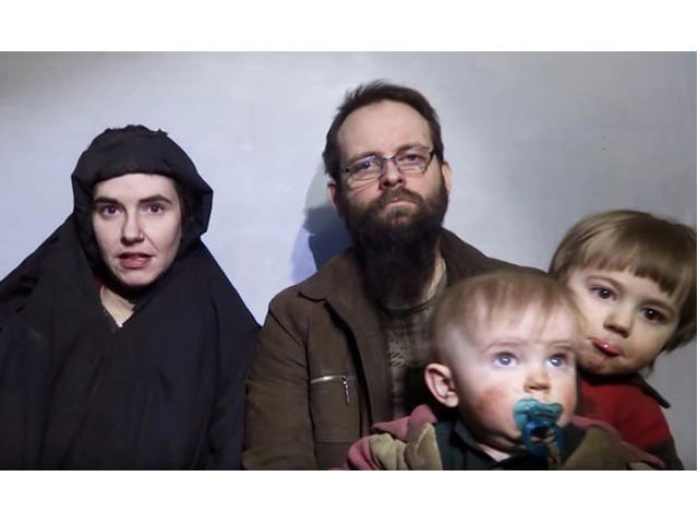 a still image from a video posted by the taliban on social media on 19 december 2016 shows american caitlan coleman left speaking next to her canadian husband joshua boyle and their two sons photo reuters