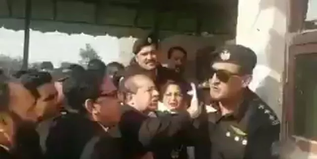 a lawyer is seen slapping a security official deputed outside an accountability court in islamabad on friday october 13 2017 screengrab a lawyer is seen slapping a security official deputed outside an accountability court in islamabad on friday october 13 2017 screengrab