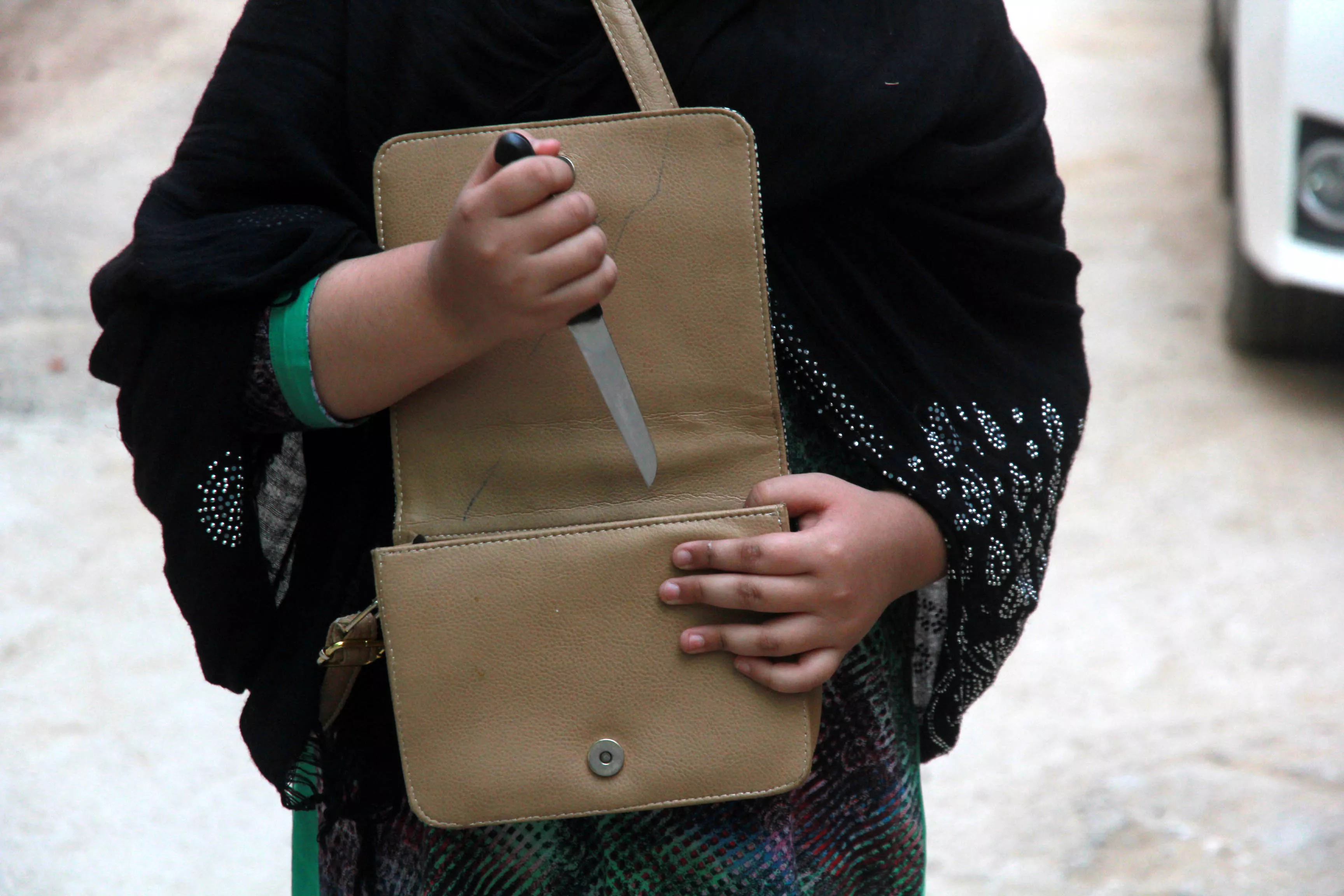 women are carrying knives in their bags to protect themselves against the knifeman photo express women are carrying knives in their bags to protect themselves against the knifeman photo express