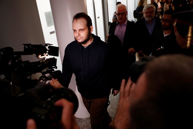 joshua boyle walks through the airport after arriving with his wife and three children at toronto pearson international airport nearly 5 years after he and his wife were abducted in afghanistan in 2012 by the taliban allied haqqani network in toronto ontario canada october 13 2017