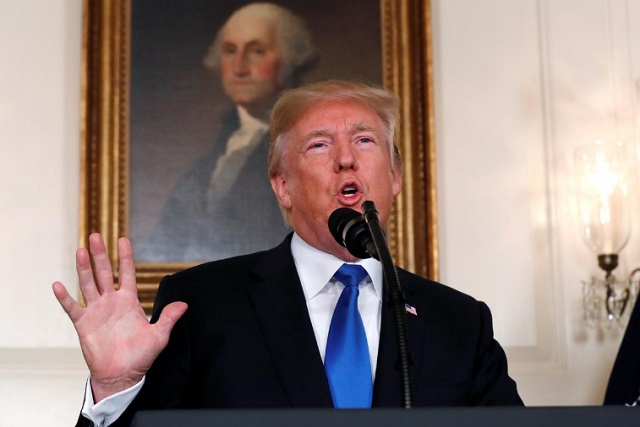 us president donald trump speaks about iran and the iran nuclear deal in front of a portrait of president george washington in the diplomatic room of the white house in washington photo reuters