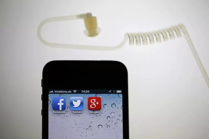 the application icons of facebook twitter and google are displayed on an iphone next to an earphone set in this illustration photo taken in berlin june 17 2013 photo reuters the application icons of facebook twitter and google are displayed on an iphone next to an earphone set in this illustration photo taken in berlin june 17 2013 photo reuters