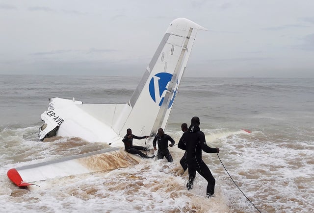 rescuers pull the wreckage of a propeller engine cargo plane after it crashed in the sea near the international airport in ivory coast 039 s main city abidjan october 14 2017 photo reuters