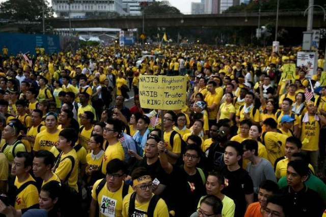 tens of thousands of people have taken to the streets in kuala lumpur to demand the resignation of malaysian prime minister najib razak photo afp tens of thousands of people have taken to the streets in kuala lumpur to demand the resignation of malaysian prime minister najib razak photo afp