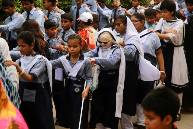 children from ida rieu school took part in the walk to raise awareness about the visually impaired photo athar khan express children from ida rieu school took part in the walk to raise awareness about the visually impaired photo athar khan express