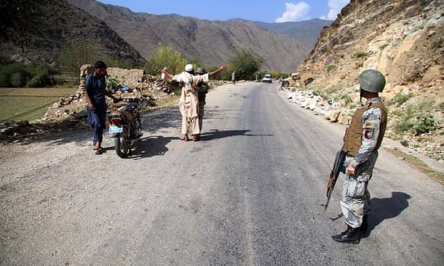 security officials stand guard on a highway near the area where a us drone strike is reported to have taken place photo online security officials stand guard on a highway near the area where a us drone strike is reported to have taken place photo online