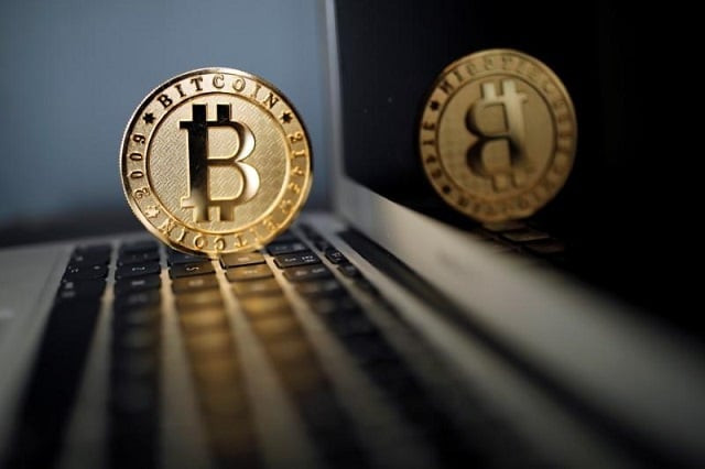 a bitcoin virtual currency coin is seen in an illustration picture taken at la maison du bitcoin in paris france june 23 2017 photo reuters a bitcoin virtual currency coin is seen in an illustration picture taken at la maison du bitcoin in paris france june 23 2017 photo reuters