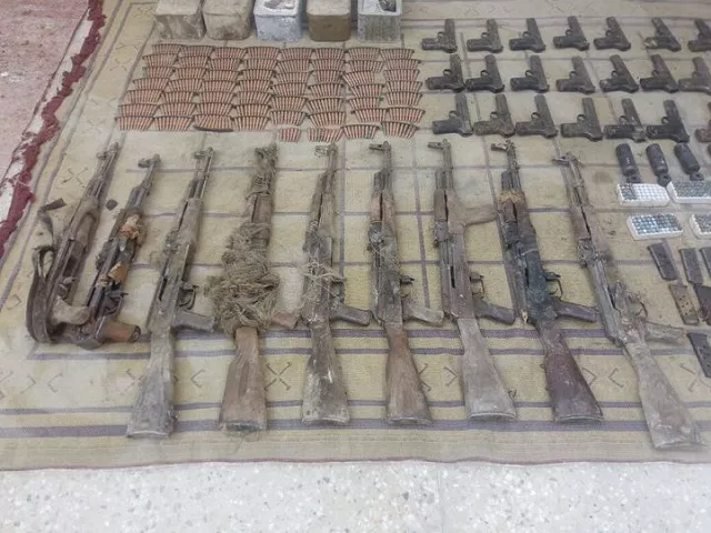 a large quantity of arms including rockets machine guns rifles and pistols and ammunition were seized photo ispr a large quantity of arms including rockets machine guns rifles and pistols and ammunition were seized photo ispr