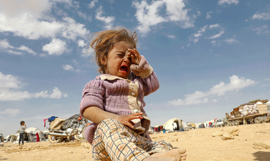 a girl cries at a refugee camp for people displaced in fighting between the syrian democratic forces and islamic state militants in ain issa syria photo reuters