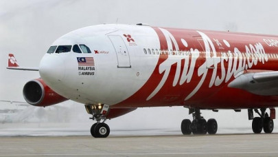 terror as airasia flight turns back to australia terror as airasia flight turns back to australia