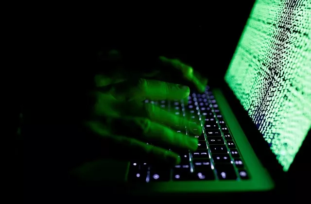 a man types on a computer keyboard in front of the displayed cyber code in this illustration picture taken on march 1 2017 photo reuters a man types on a computer keyboard in front of the displayed cyber code in this illustration picture taken on march 1 2017 photo reuters