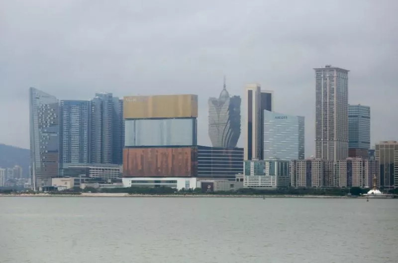 mgm macau in three colours and grand lisboa c casinos are seen in macau photo reuters mgm macau in three colours and grand lisboa c casinos are seen in macau photo reuters