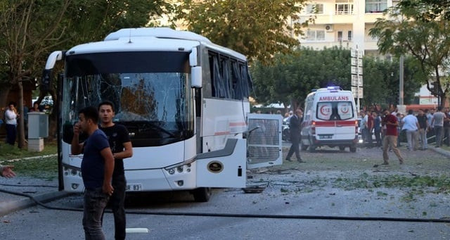 images of the vehicle published by the dogan news agency showed a white bus with its windows blown out by the force of the blast a fire burning still in the back of the vehicle and glass scattered on the roadside photo iha images of the vehicle published by the dogan news agency showed a white bus with its windows blown out by the force of the blast a fire burning still in the back of the vehicle and glass scattered on the roadside photo iha