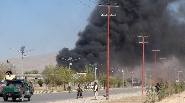 smoke billowed from a police station in gardez the capital of paktia province afghanistan on tuesday after it was attacked photo reuters