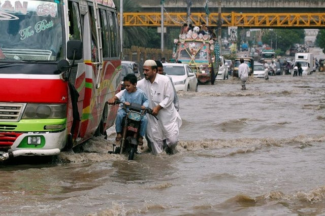 traffic snarled up on major arteries of the city as water began to stand on the streets turning short commutes into an ordeal of hours traffic snarled up on major arteries of the city as water began to stand on the streets turning short commutes into an ordeal of hours