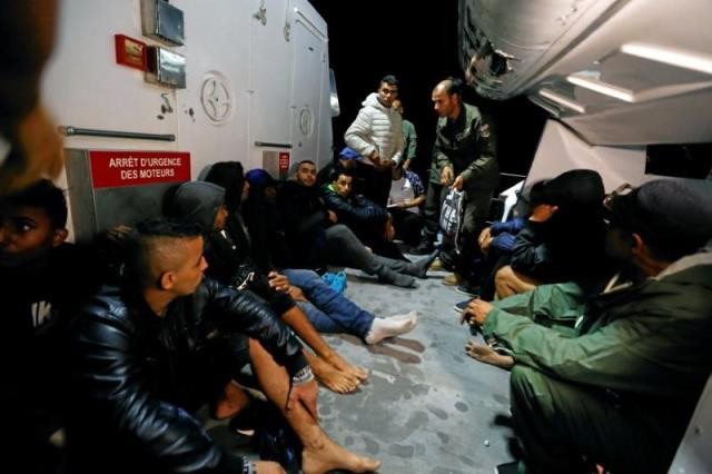 migrants are seen on a boat after they were rescued by tunisian coast guard off the coast of bizerte tunisia october 12 2017 photo reuters migrants are seen on a boat after they were rescued by tunisian coast guard off the coast of bizerte tunisia october 12 2017 photo reuters