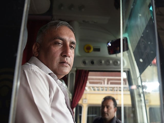 this photograph taken on october 8 2017 shows bus driver meher muhammad khalil who drove the sri lankan cricket team to safety when it came under a gun and grenade attack by militants in march 2009 preparing to start his shift at a bus terminal in lahore photo afp this photograph taken on october 8 2017 shows bus driver meher muhammad khalil who drove the sri lankan cricket team to safety when it came under a gun and grenade attack by militants in march 2009 preparing to start his shift at a bus terminal in lahore photo afp