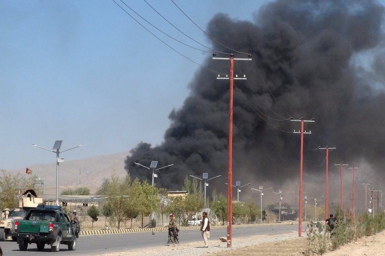 smoke billowed from a police station in gardez photo reuters