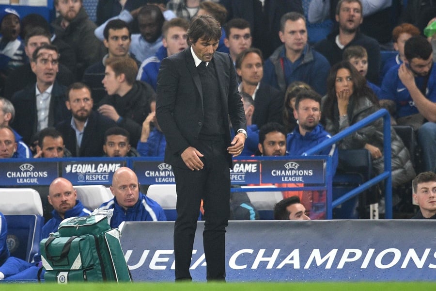 chelsea 039 s italian head coach antonio conte reacts after roma scored during a uefa champions league group stage football match between chelsea and roma at stamford bridge in london on october 18 2017 photo afp