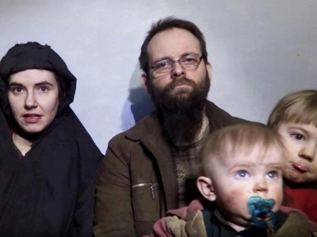 a still image from a video posted by the taliban on social media on december 19 2016 shows american caitlan coleman l speaking next to her canadian husband joshua boyle and their two sons photo reuters