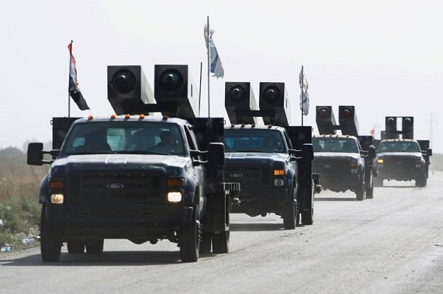 iraqi forces drive towards kurdish peshmerga positions on the southern outskirts of kirkuk city on october 14 2017 photo afp iraqi forces drive towards kurdish peshmerga positions on the southern outskirts of kirkuk city on october 14 2017 photo afp