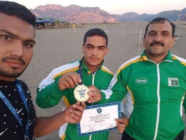 inayatullah recently won gold medal in world beach wrestling championship in turkey photo file