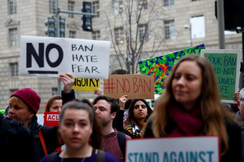 immigration activists including members of the dc justice for muslims coalition rally against the trump administration 039 s new ban against travelers from six muslim majority nations outside of the u s customs and border protection headquarters in washington us photo reuters