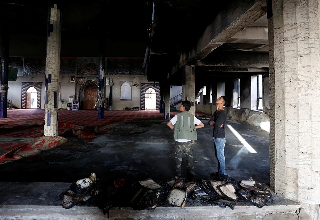 afghans stand inside a shia muslim mosque after yesterday 039 s attack in kabul afghanistan august 26 2017 photo reuters