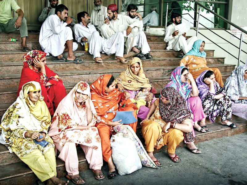 patients waiting outside services hospital top no doctors inside the opd at sir ganga ram hospital photo abid nawaz and riaz ahmed express