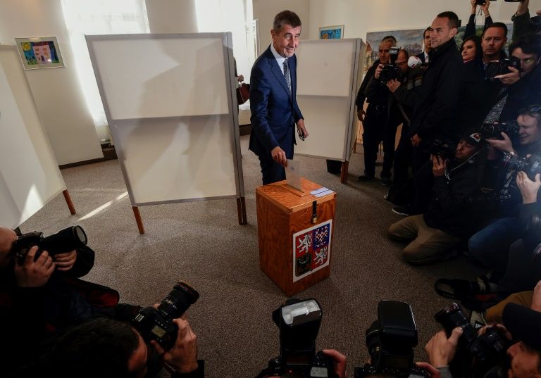 czech billionaire andrej babis chairman of the anti migrant ano movement casts his ballot at a polling station near prague in an election that could see the 039 czech trump 039 take power photo afp