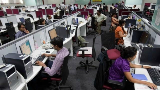 men women work alongside in an office photo reuters men women work alongside in an office photo reuters
