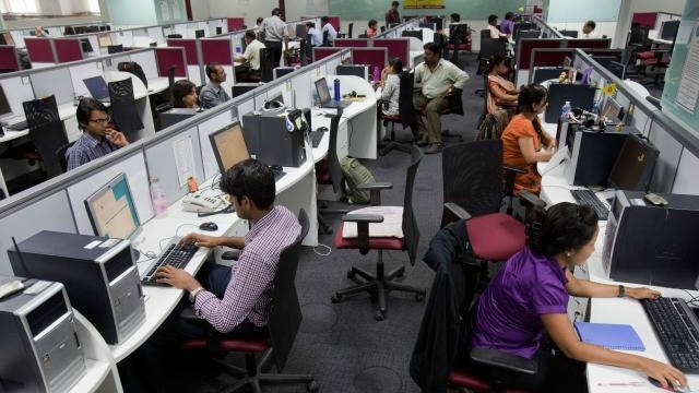 men women work alongside in an office photo reuters