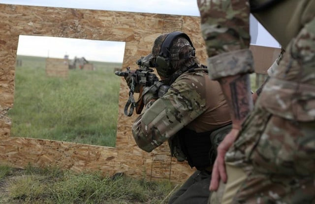 members of self described patriot groups and militias run through shooting drills during iii united patriots field training exercise which they describe as the largest patriot event in the country outside fountain colorado photo reuters members of self described patriot groups and militias run through shooting drills during iii united patriots field training exercise which they describe as the largest patriot event in the country outside fountain colorado photo reuters