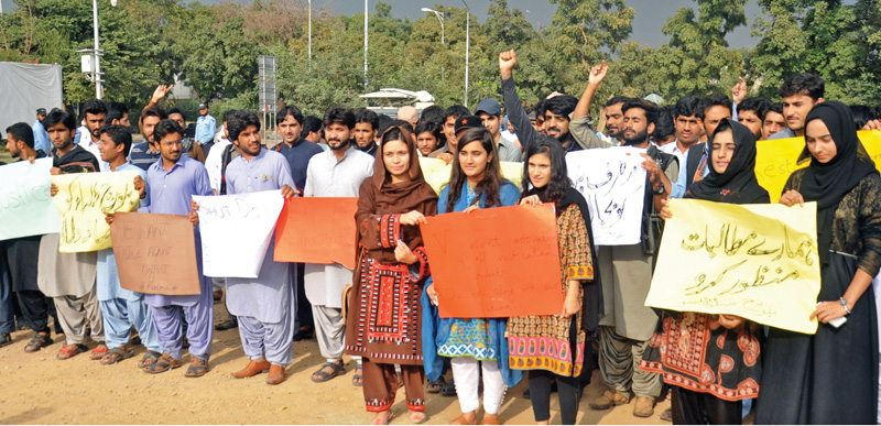 baloch students of qau protest in front of npc photo online