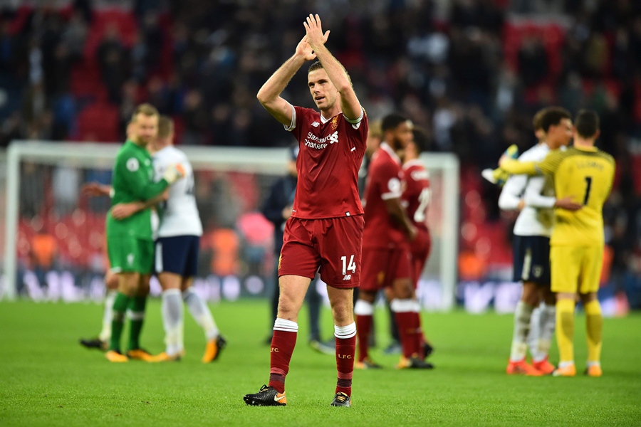 liverpool 039 s english midfielder jordan henderson applauds supporters on the pitch after the english premier league football match between tottenham hotspur and liverpool at wembley stadium in london on october 22 2017 tottenham won the game 4 1 photo afp