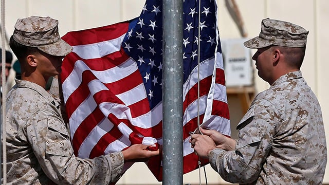 american soldiers raise the us flag photo reuters