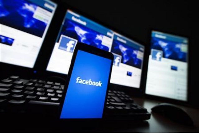 the loading screen of the facebook application on a mobile phone is seen in this photo illustration taken in lavigny may 16 2012 photo reuters