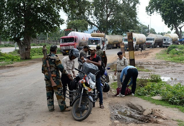 in this photograph taken on august 20 2017 indian excise department officers at the bihar jharkhand interstate border search for alcohol entering bihar at a checkpoint in rajauli 150km south of patna photo afp in this photograph taken on august 20 2017 indian excise department officers at the bihar jharkhand interstate border search for alcohol entering bihar at a checkpoint in rajauli 150km south of patna photo afp