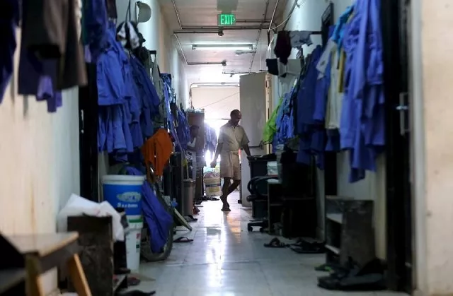a labourer is pictured in a foreign workers dormitory in the sanaya industrial area in doha photo reuters a labourer is pictured in a foreign workers dormitory in the sanaya industrial area in doha photo reuters