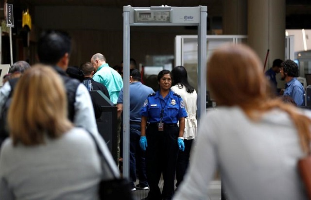 travelers stand in line to go through transportation security administration tsa check points at los angeles international airport in los angeles u s may 31 2016 photo reuters