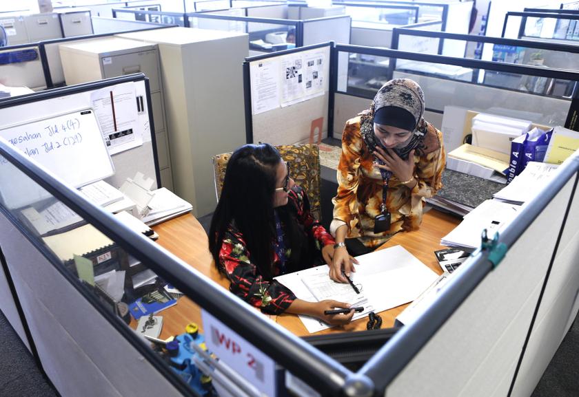 women work in office photo reuters