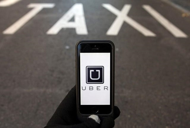 the logo of car sharing service app uber on a smartphone over a reserved lane for taxis in a street is seen in this photo illustration taken in madrid on december 10 2014 photo reuters the logo of car sharing service app uber on a smartphone over a reserved lane for taxis in a street is seen in this photo illustration taken in madrid on december 10 2014 photo reuters