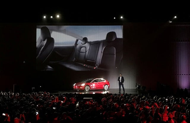 tesla chief executive elon musk introduces one of the first model 3 cars off the fremont factory 039 s production line during an event at the company 039 s facilities in fremont california us july 28 2017 photo reuters tesla chief executive elon musk introduces one of the first model 3 cars off the fremont factory 039 s production line during an event at the company 039 s facilities in fremont california us july 28 2017 photo reuters