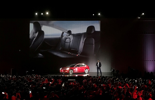 tesla chief executive elon musk introduces one of the first model 3 cars off the fremont factory 039 s production line during an event at the company 039 s facilities in fremont california us july 28 2017 photo reuters