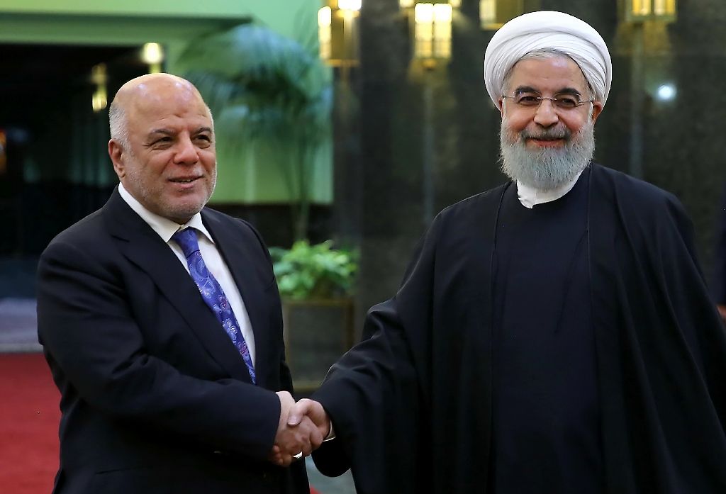 iraqi prime minister haidar al abadi l meets iranian president hassan rouhani in tehran on october 26 2017 as his forces launch an assault on the islamic state group 039 s last redoubt in iraq photo afp