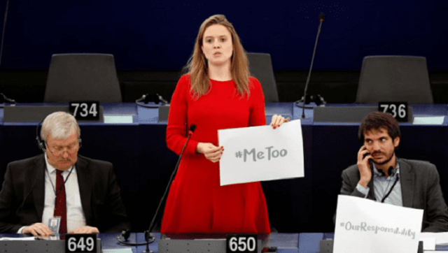 european parliament member terry reintke c holds a placard with the hashtag quot metoo quot during a debate on sexual harassment at the european parliament on oct 25 2017 photo reuters