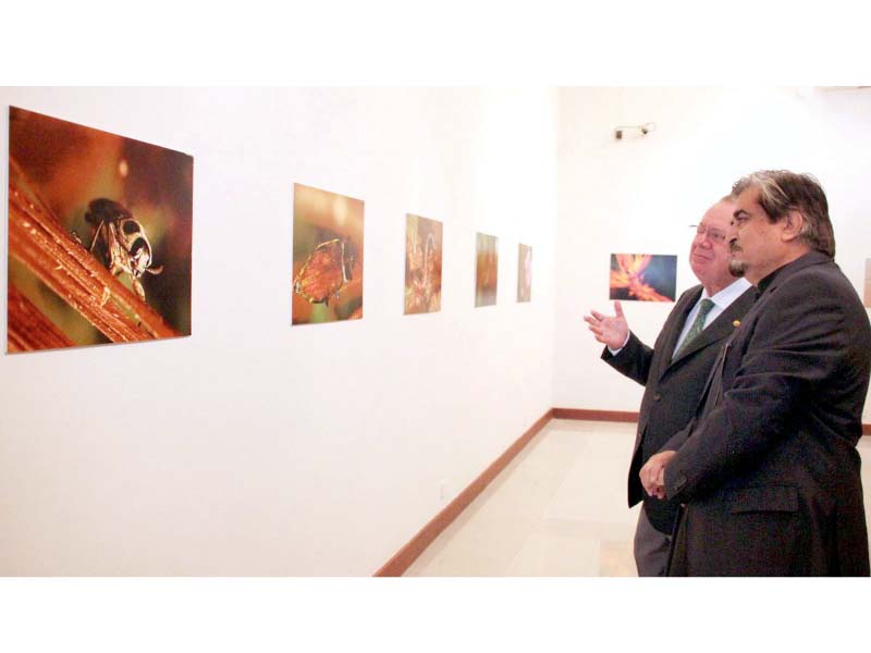 pnca director general jamal shah and colombian ambassador juan alfredo pinto saavedra at the exhibition amazing amazon organised by pnca and embassy of colombia at pnca photo express