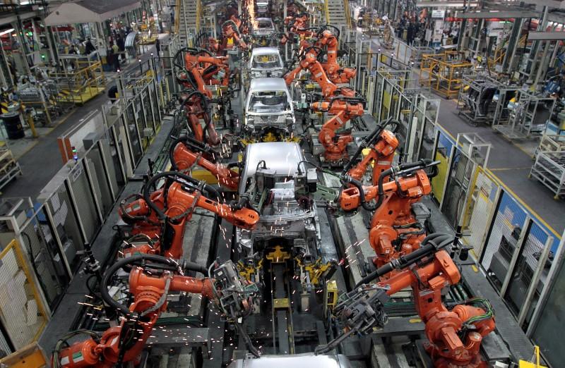 cars are assembled at a plant photo reuters